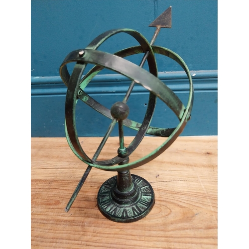 707 - Cast iron armillary sundial. {30 cm H x 30 cm W x 16 cm D}.