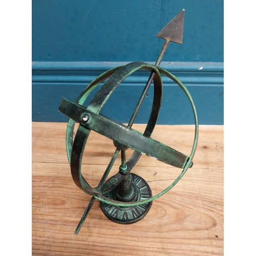 707 - Cast iron armillary sundial. {30 cm H x 30 cm W x 16 cm D}.