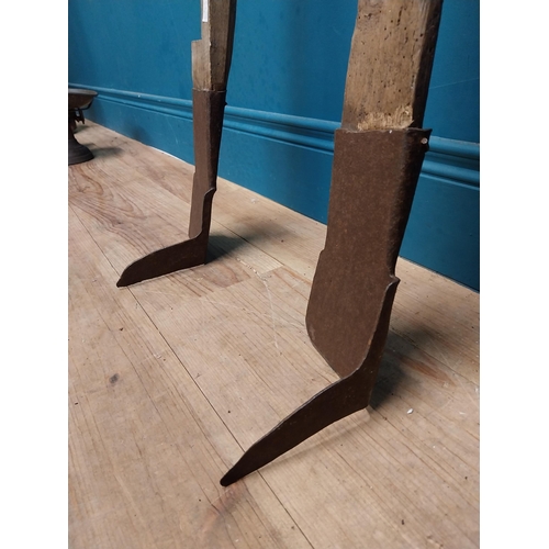 553 - Two 19th C. winged turf slaynes. {97 cm H}.