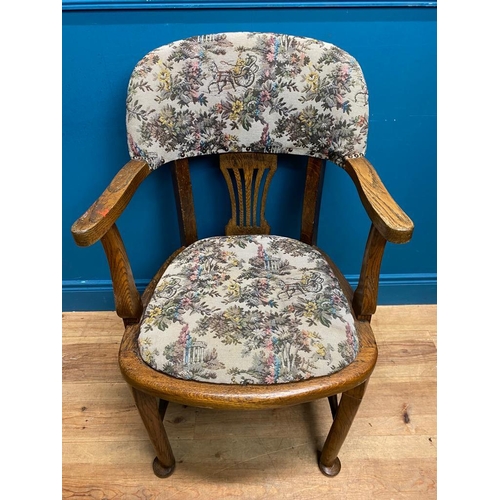 555 - 1940's oak office chair with upholstered seat and back. {92 cm H x 57 cm W x 50 cm D}.