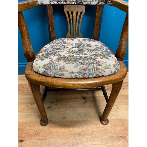 555 - 1940's oak office chair with upholstered seat and back. {92 cm H x 57 cm W x 50 cm D}.