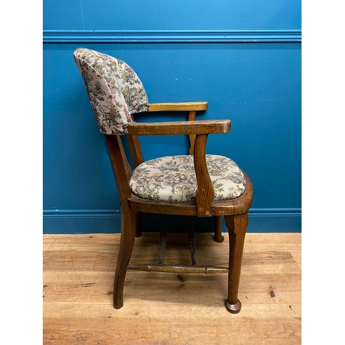 555 - 1940's oak office chair with upholstered seat and back. {92 cm H x 57 cm W x 50 cm D}.