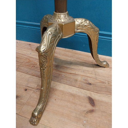 558 - Decorative brass hat and coat stand on three outswept feet. {170 cm H x 50 cm Dia}