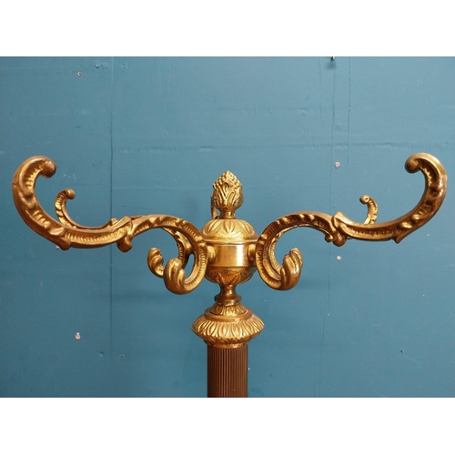 558 - Decorative brass hat and coat stand on three outswept feet. {170 cm H x 50 cm Dia}