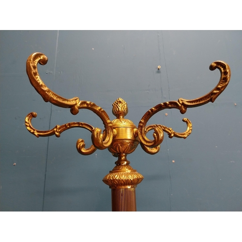 558 - Decorative brass hat and coat stand on three outswept feet. {170 cm H x 50 cm Dia}