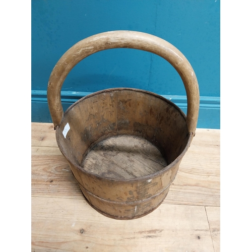 560 - 19th C. metal bound log bucket with handle. {44 cm H x 40 cm Dia.}.