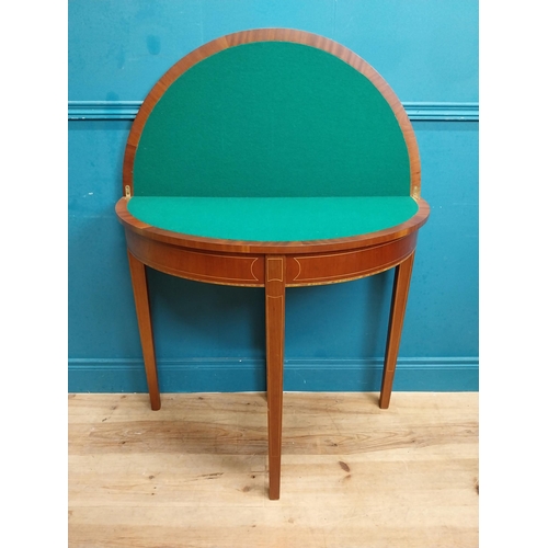 564 - Edwardian mahogany and satinwood inlaid card table on tapered legs. {77 cm H x 89 cm W x 44 cm D}.