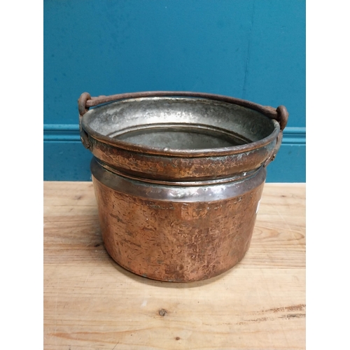 569 - 19th C. copper coal bucket with wrought iron handle. {39 cm H x 30 cm Dia.}.