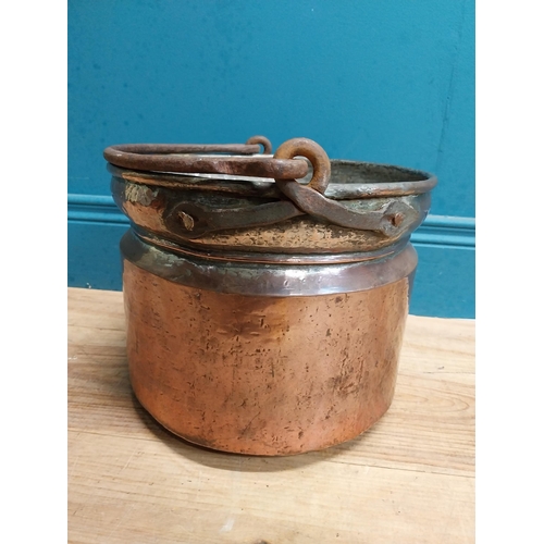 569 - 19th C. copper coal bucket with wrought iron handle. {39 cm H x 30 cm Dia.}.