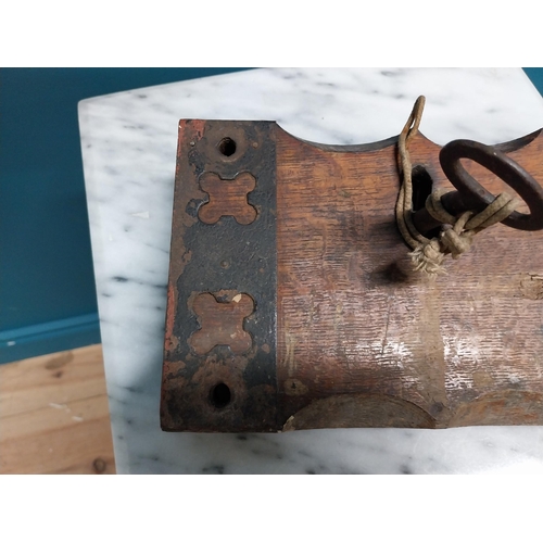 571 - 19th C. oak and metal lock with original key. {4 cm H x 26 cm W x 16 cm D}