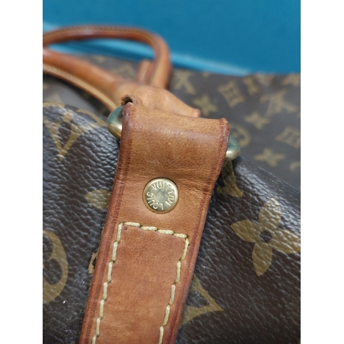 573 - Vintage handbag and holdall.