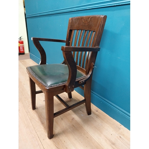 58 - 1940's oak desk chair with upholstered leather seat. {90 cm H x 55 cm W x 40 cm D}.