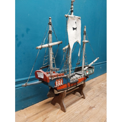 583 - Wooden model of a Galleon on base. {50 cm H x 63 cm W x 13 cm D}.