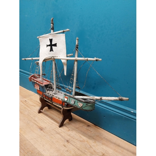 583 - Wooden model of a Galleon on base. {50 cm H x 63 cm W x 13 cm D}.