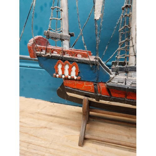 583 - Wooden model of a Galleon on base. {50 cm H x 63 cm W x 13 cm D}.