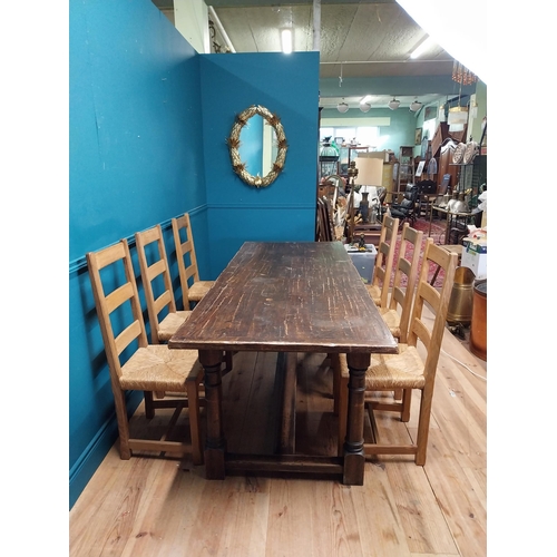 585 - Stained pine and oak kitchen table on four turned legs with single stretcher. {79 cm H x 220 cm W  x... 