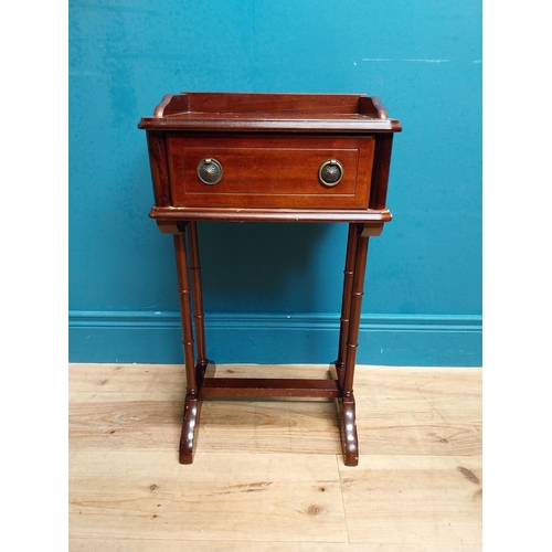 588 - Mahogany side table with single drawer in frieze. {65 cm H x 38 cm W x 30 cm D}.