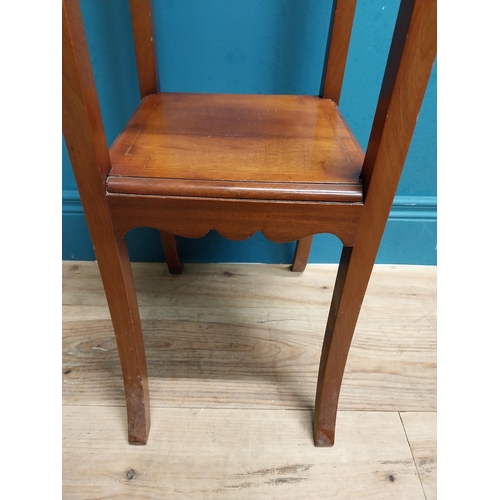 590 - Edwardian mahogany jardiniere stand. {109 cm H x 30 cm W x 30 cm D}.