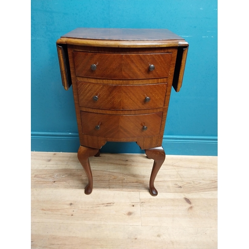 592 - 1950's mahogany drop leaf side table with three drawers. {73 cm H x 42 cm W x 34 cm D}.