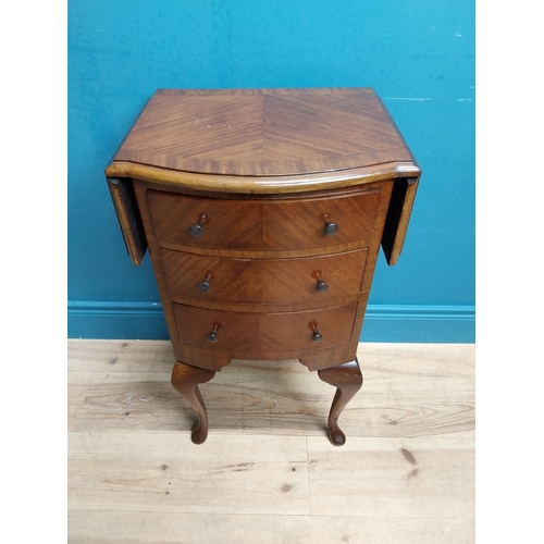 592 - 1950's mahogany drop leaf side table with three drawers. {73 cm H x 42 cm W x 34 cm D}.