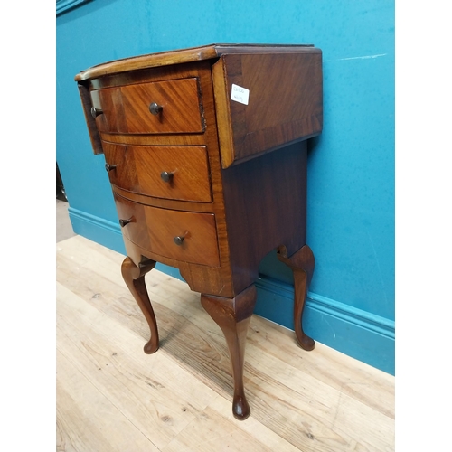 592 - 1950's mahogany drop leaf side table with three drawers. {73 cm H x 42 cm W x 34 cm D}.