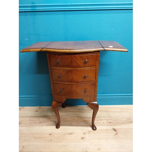 592 - 1950's mahogany drop leaf side table with three drawers. {73 cm H x 42 cm W x 34 cm D}.