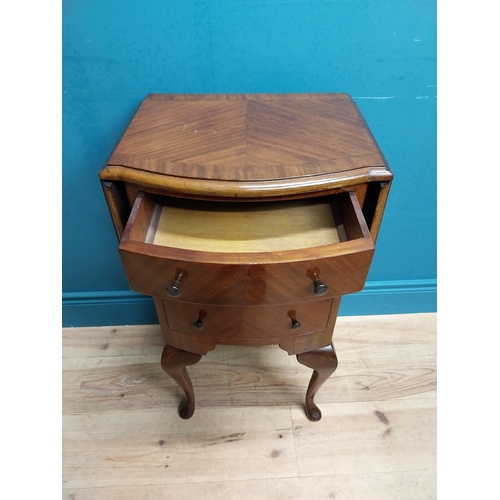 592 - 1950's mahogany drop leaf side table with three drawers. {73 cm H x 42 cm W x 34 cm D}.