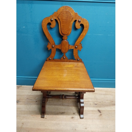 593 - Edwardian oak side chair in the Gothic style. {94 cm H x 46 cm W x 40 cm D}.