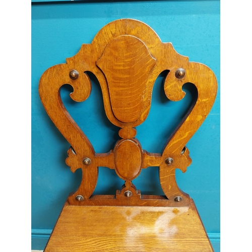 593 - Edwardian oak side chair in the Gothic style. {94 cm H x 46 cm W x 40 cm D}.