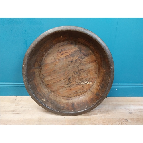 596 - Large early 20th C. wooden bowl with twisted metal banding. {20 cm H x 70 cm Dia.}