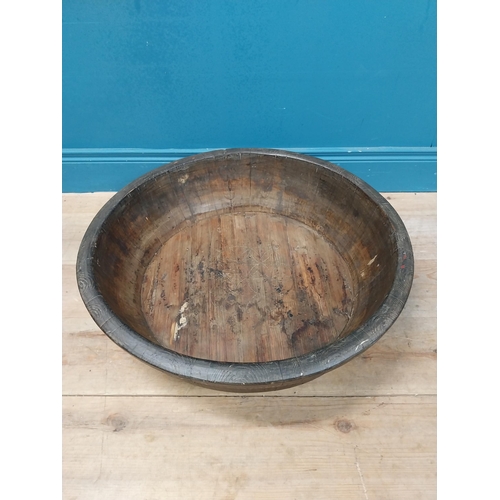 596 - Large early 20th C. wooden bowl with twisted metal banding. {20 cm H x 70 cm Dia.}