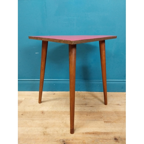 599 - Retro corner table raised on three tapered legs. {61 cm H x 66 cm W x 47 cm D}.