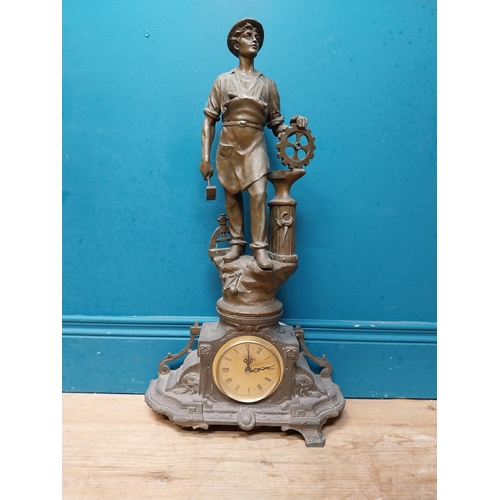 620 - Edwardian French spelter clock surmounted by blacksmith. {65 cm H x 26 cm W x 16 cm D}.