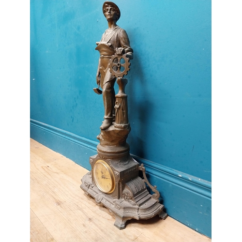 620 - Edwardian French spelter clock surmounted by blacksmith. {65 cm H x 26 cm W x 16 cm D}.