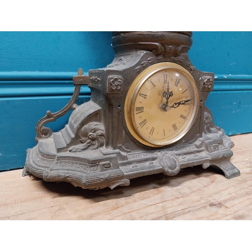 620 - Edwardian French spelter clock surmounted by blacksmith. {65 cm H x 26 cm W x 16 cm D}.