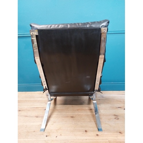 626 - Mid century designer leather upholstered and chrome armchair. {107 cm H x 67 cm W x 80 cm D}.