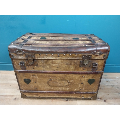 627 - Early 20th C. leather bound marriage chest with heart and studded decoration and initialled V N. {67... 