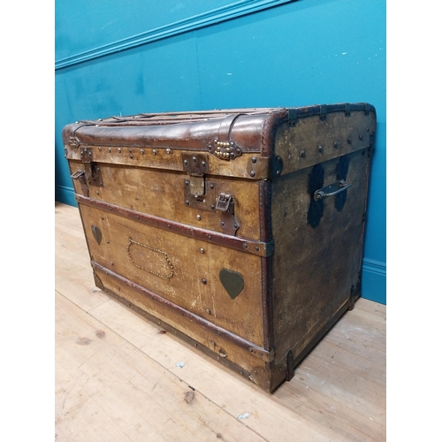 627 - Early 20th C. leather bound marriage chest with heart and studded decoration and initialled V N. {67... 