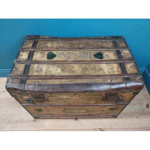 627 - Early 20th C. leather bound marriage chest with heart and studded decoration and initialled V N. {67... 