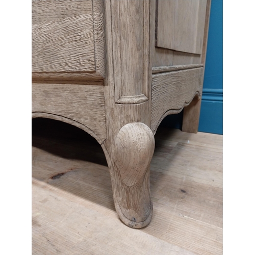 63 - 19th C. bleached oak French chest of drawers on cabriole legs. {91 cm H x 121 cm W x 51 cm D}.