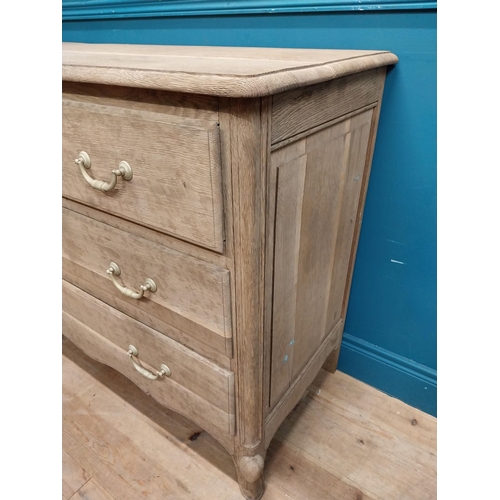 63 - 19th C. bleached oak French chest of drawers on cabriole legs. {91 cm H x 121 cm W x 51 cm D}.