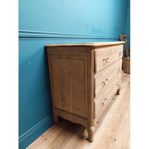 63 - 19th C. bleached oak French chest of drawers on cabriole legs. {91 cm H x 121 cm W x 51 cm D}.