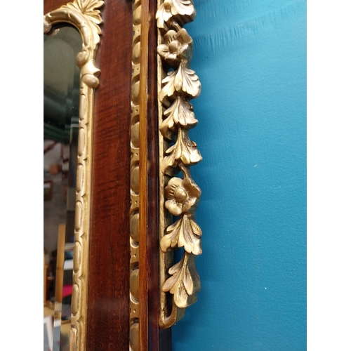 638 - 19th C. walnut and partial gilt wall mirror decorated with leaves and flowers. {107 cm H x 111 cm W}... 