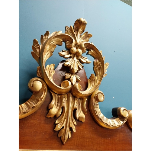 638 - 19th C. walnut and partial gilt wall mirror decorated with leaves and flowers. {107 cm H x 111 cm W}... 