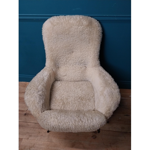 645 - Retro upholstered armchair. {102 cm H x 82 cm W x 85 cm D}.