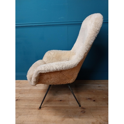 645 - Retro upholstered armchair. {102 cm H x 82 cm W x 85 cm D}.