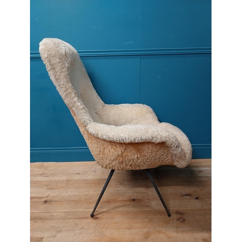 645 - Retro upholstered armchair. {102 cm H x 82 cm W x 85 cm D}.