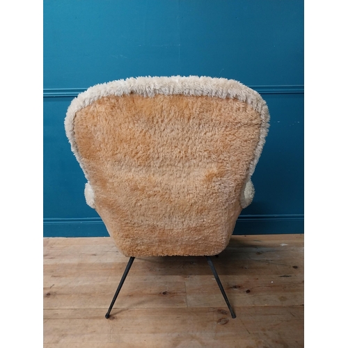 645 - Retro upholstered armchair. {102 cm H x 82 cm W x 85 cm D}.