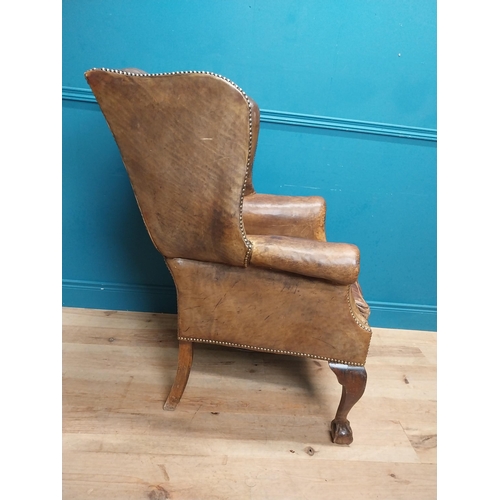 71 - Early 20th C. hand dyed deep buttoned leather wing back arm chair. {106 cm H x 80 cm W x 82 cm D}.