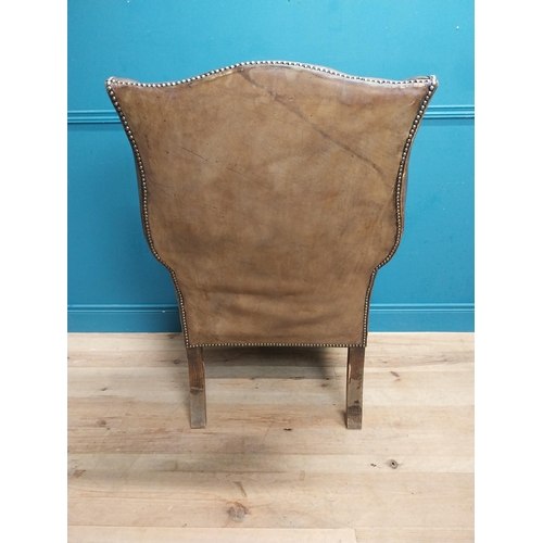 71 - Early 20th C. hand dyed deep buttoned leather wing back arm chair. {106 cm H x 80 cm W x 82 cm D}.